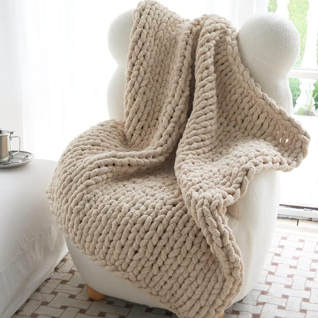 Chunky knit throw blanket in soft beige color