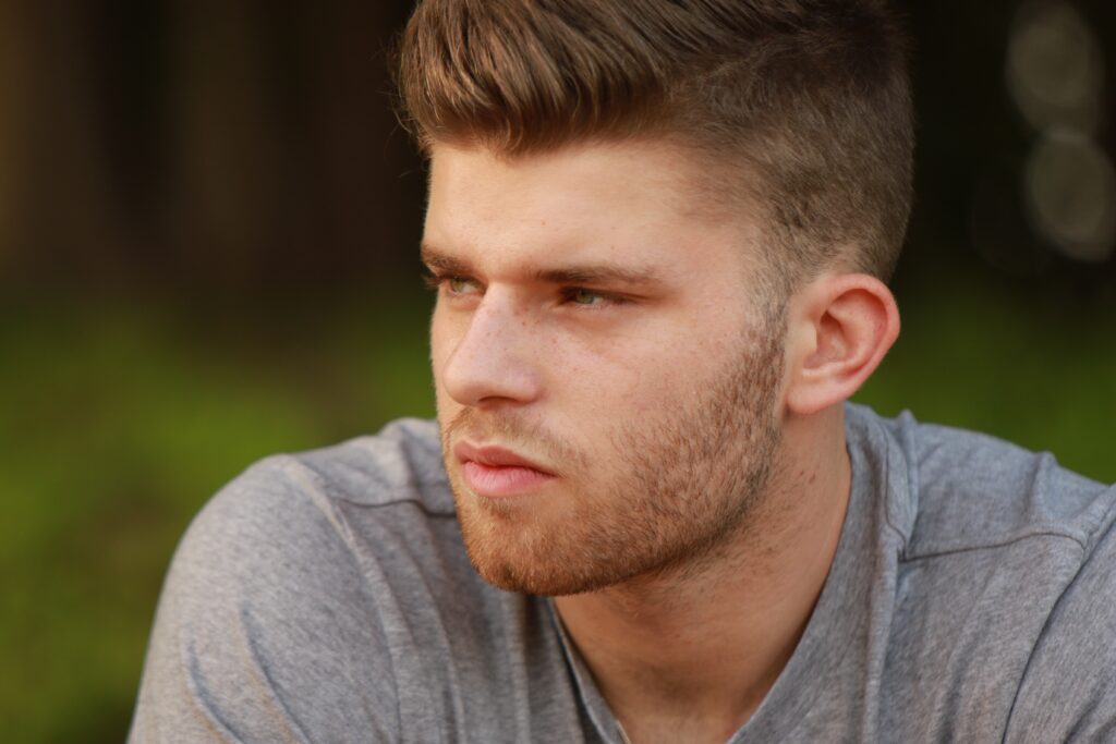 Taper fade haircut with subtle yet clean tapering on the sides