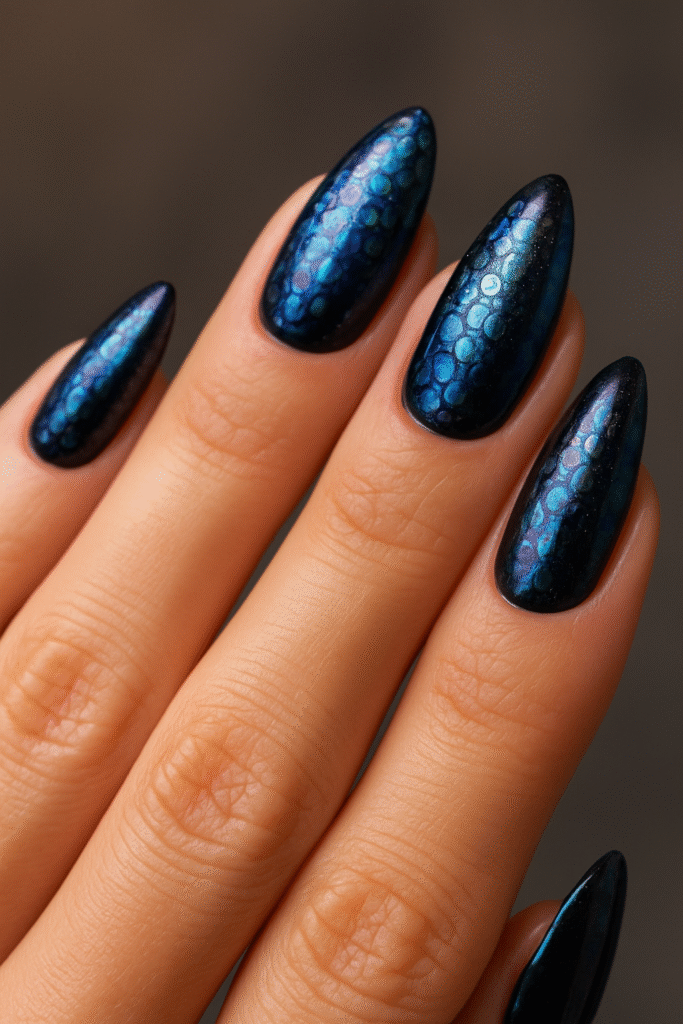 Bold bubble nails with black base and oil-slick chrome finish