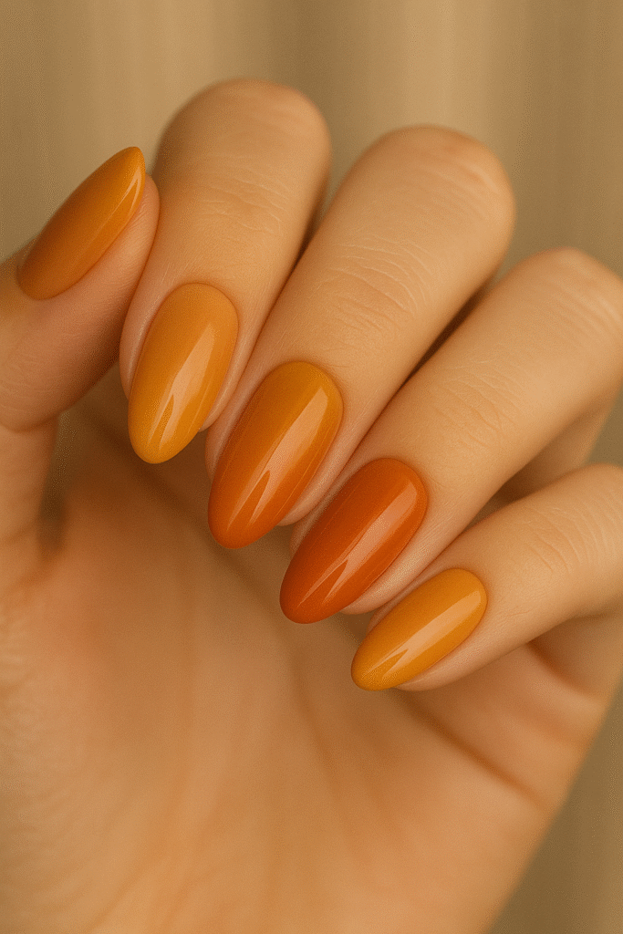 Caramel-to-pumpkin gradient manicure perfect for October