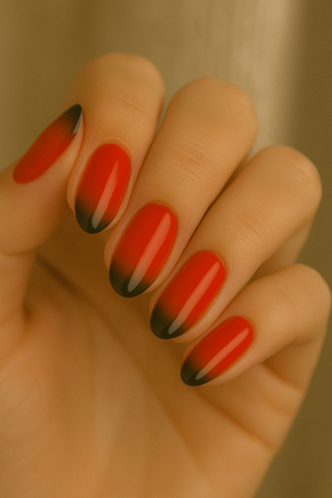 Poppy red October Nails with whisper-smoked black tips